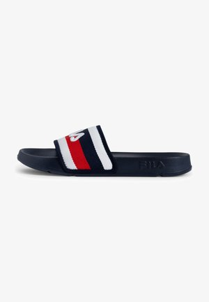 Navy slide sandal with a fabric strap featuring white and red stripes, textured footbed, and rubber sole. Logo embossed on the side.
