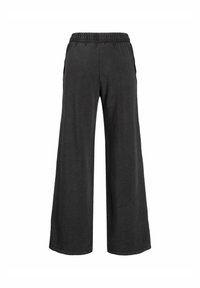 Schwarze weit geschnittene Hose aus weichem Stoff, mit elastischem Bund und Seitentaschen, im lässigen Schnitt und mit glatter Oberfläche.