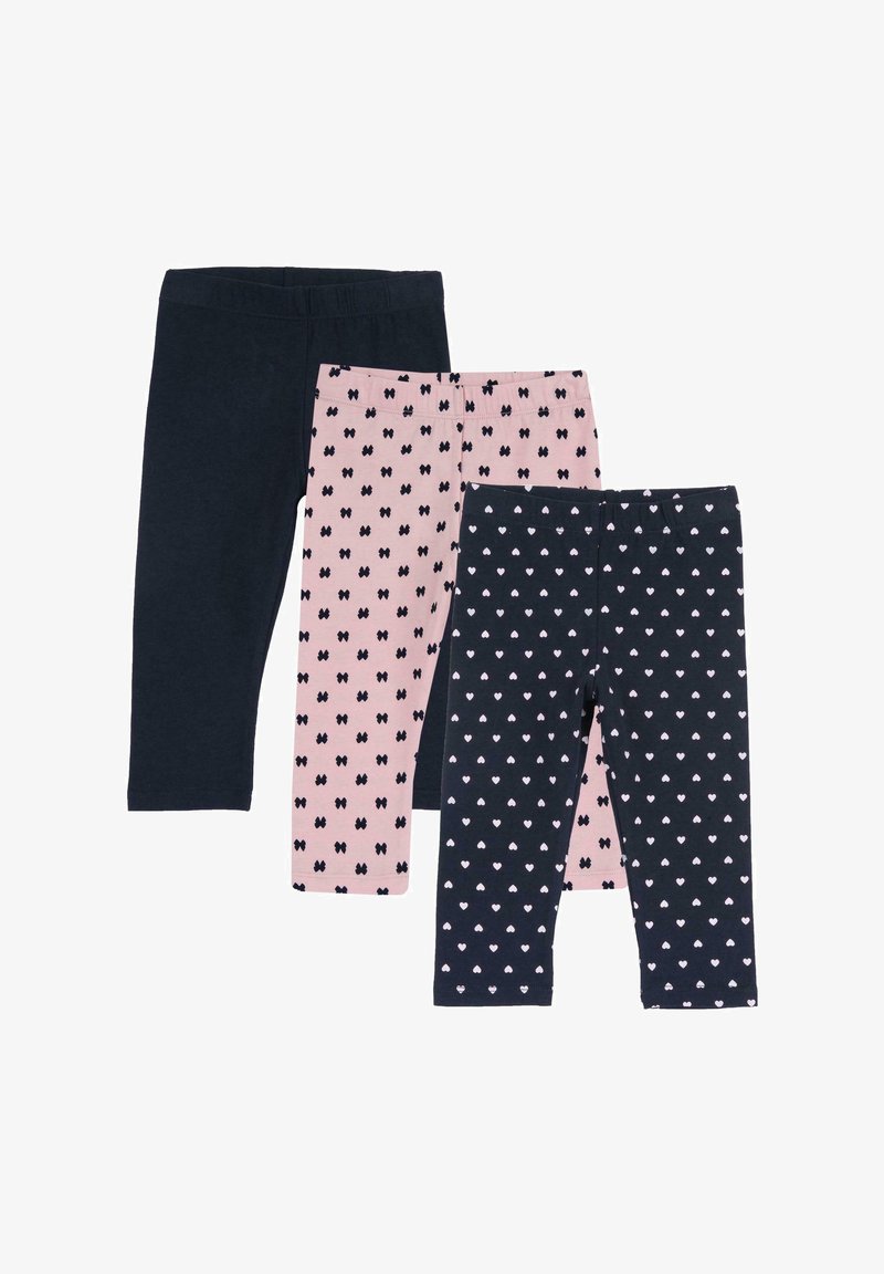 Trois paires de leggings : une bleue marine unie, une rose avec des nœuds noirs, et une bleue marine avec de petits cœurs roses. Tous possèdent des ceintures élastiques.