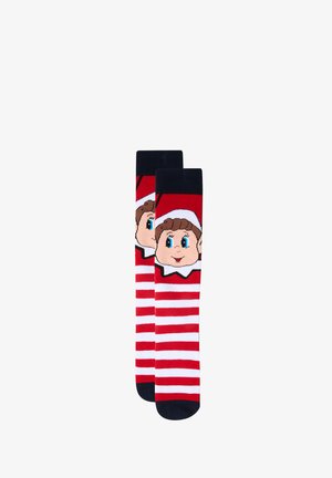 Red and white striped socks featuring a cartoon elf face with a brown curly hairstyle, blue eyes, and a white hat, finished with navy cuffs.