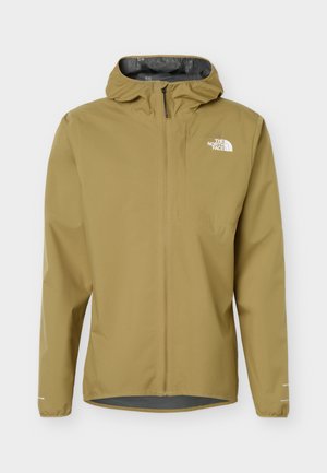 Lys brun vanntett hettejakke med frontglidelås og The North Face-logo på brystet mot en ensfarget bakgrunn.