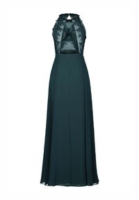 Langes türkisfarbenes Abendkleid mit hohem Ausschnitt, Spitzenoberteil und offenem Rücken. Verfügt über filigrane Stickereien und einen sanft fließenden Rock.