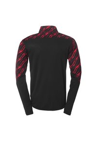 Langærmet sportsættende skjorte med en sort krop og et rødt abstrakt mønster på skuldrene. Stof ser glat ud, med en tætsiddende pasform.