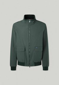 Giacca zip-up verde scuro con colletto alto, due tasche frontali, polsini e orlo a costine. Tessuto liscio senza pattern visibili o decorazioni.