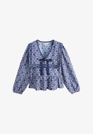 Blue floral blouse with a V-neck, puffed sleeves, and a peplum hem. Features a large collar and a tie detail at the front.