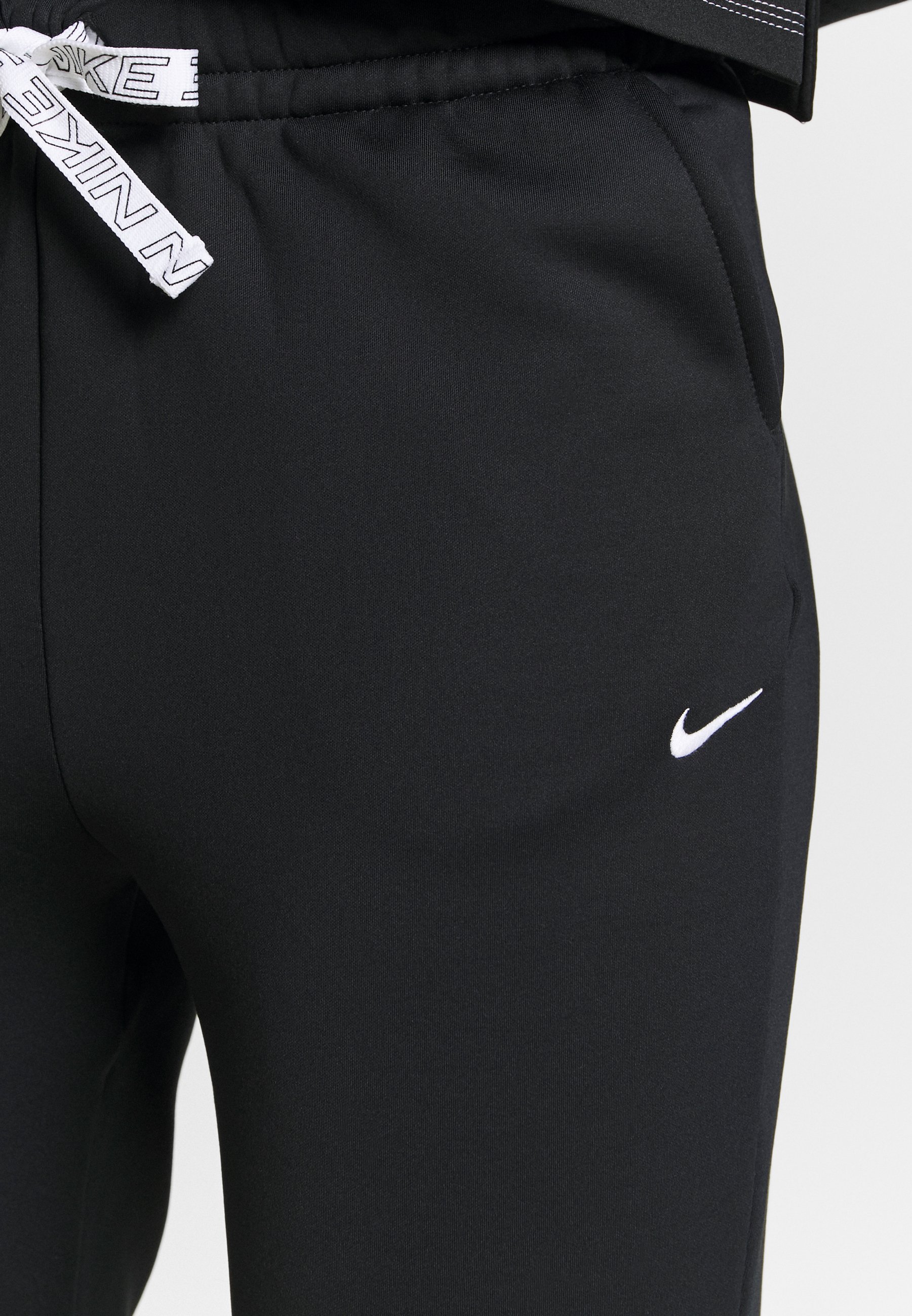 Nike Performance PANT ZIP TAPE - Trainingsbroek - black/white/Zwart -  Zalando.be