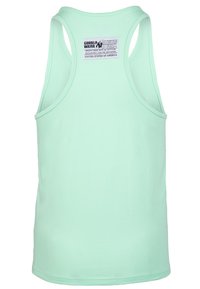 Lichtgroen racerback tanktop met een wit label bij de halslijn met de tekst "Gorilla Wear" en wasinstructies.
