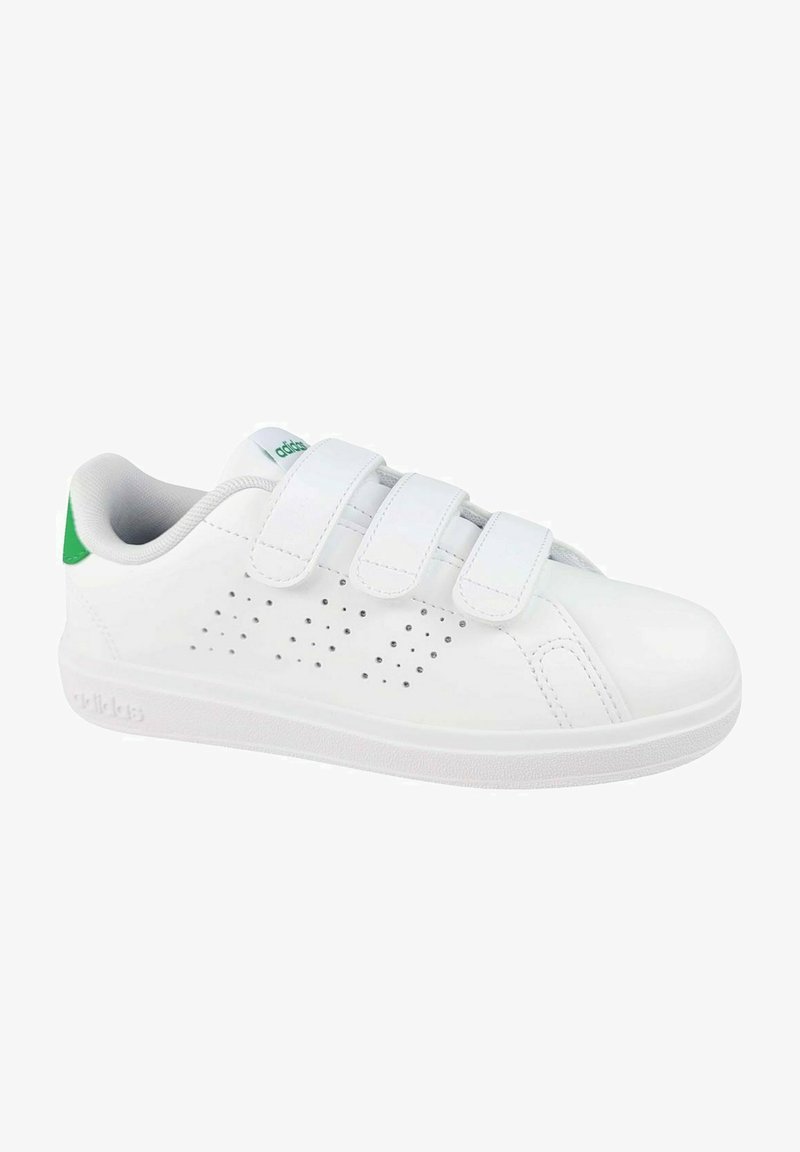 White athletic shoes with three Velcro straps, perforated side details, green accent on heel, and textured rubber sole.