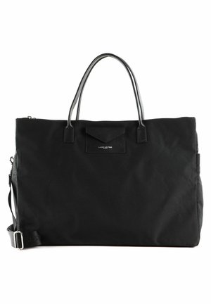 Black fabric tote bag with dual leather handles, a zip closure, and a front pocket. Features a subtle texture and minimal hardware details.