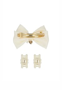 Set di accessori per capelli che include un grande fiocco in avorio con una clip dorata e due piccole clip per capelli con perle. Il fiocco presenta un dettaglio a forma di cuore.