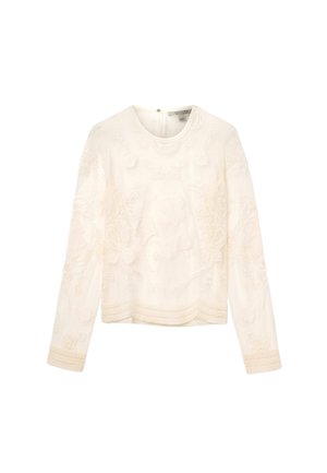 Hvid langærmet top med detaljeret blomsterbroderi, tekstureret stof, rund halsudskæring og dekorativ kantdetalje ved kanten.
