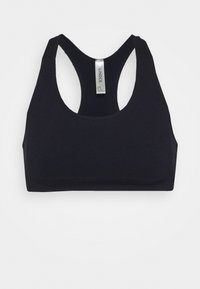 Black sports bra with a seamless design, wide straps, and a scoop neckline. Made from stretchy, soft fabric for comfort.