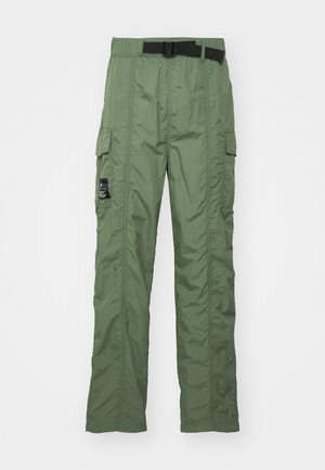 Cargo pants in olive green, made from lightweight fabric. Features a black belt, cargo pockets on sides, and stitching details.