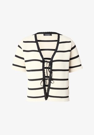 Top in maglia crema a maniche corte con righe orizzontali nere, rifiniture nere e due chiusure anteriori con laccetti.