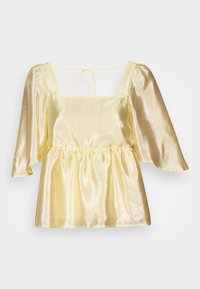 Top amarelo de cetim com decote quadrado, mangas curtas bufantes e cintura franzida. Textura suave com acabamento brilhante, laços ajustáveis nas costas.
