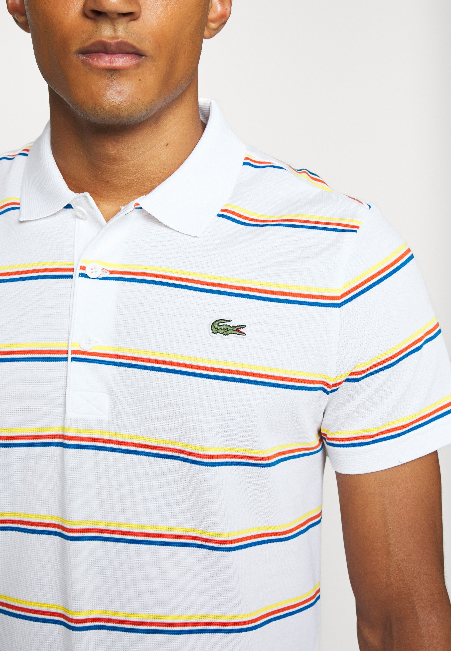 polo lacoste rayure
