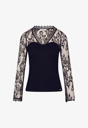 Zwarte top met een aansluitend lichaam en lange doorschijnende kantmouwen met bloemmotieven en gegolfde randen. Geribbeld motief op de torso.