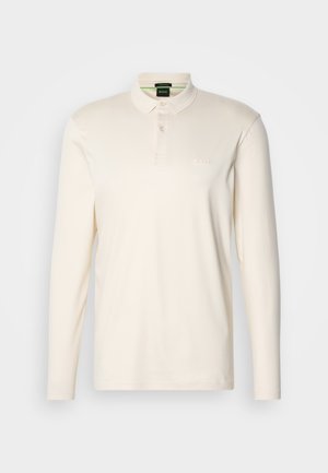 Langärmliges Polohemd aus Ecru-Baumwolle mit Kragen, Drei-Button-Leiste und dezentem Logo auf der Brust.
