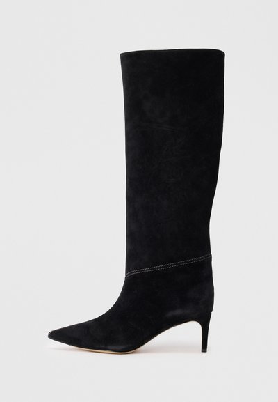 Black suede knee-high boot with a pointed toe and a slim, stiletto heel, featuring a smooth texture and subtle stitching detail.
