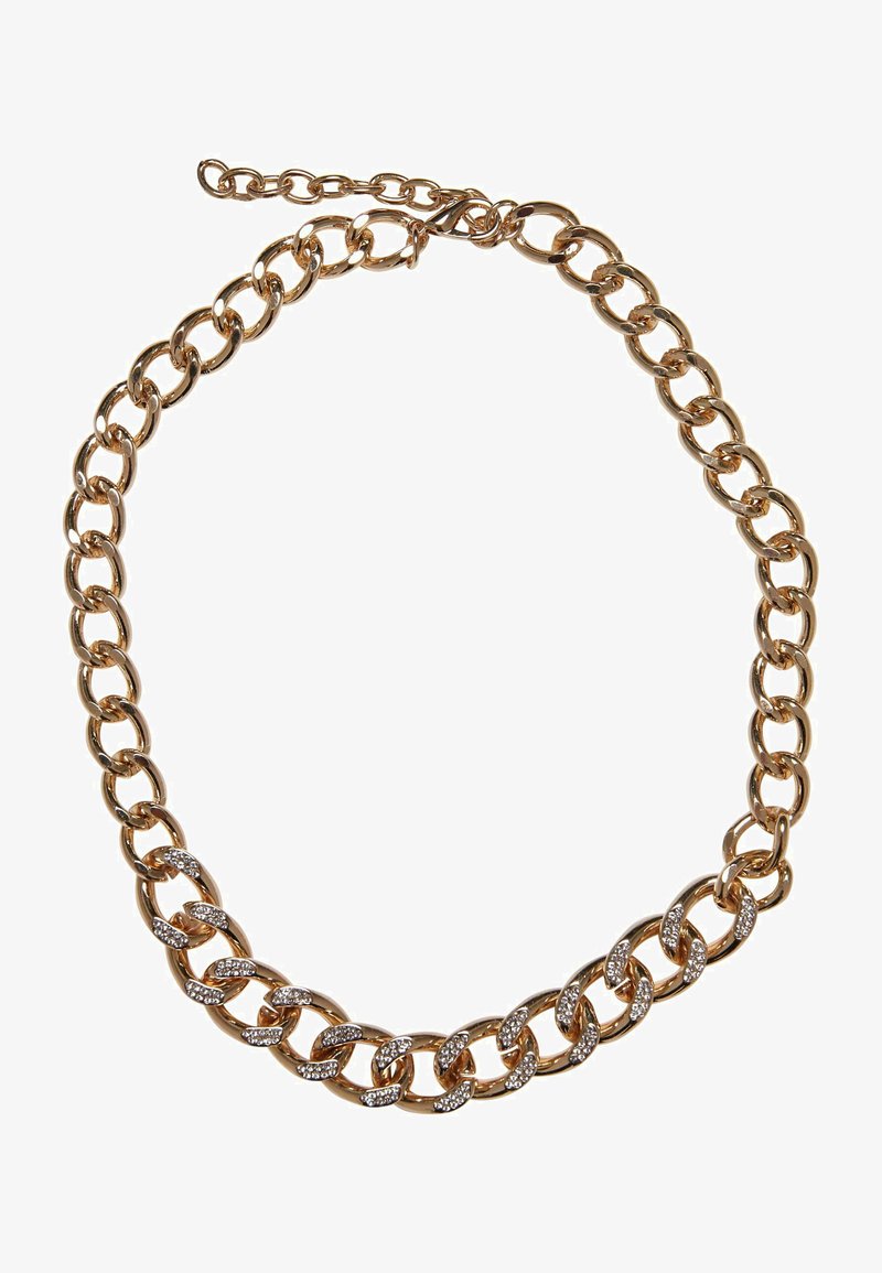 Colier din metal auriu cu zale interconectate, decorat cu cristale transparente. Finalizat cu un sistem de închidere cu claspă și un lanț de extensie.