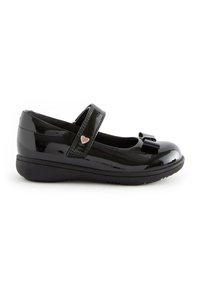 Schwarze Lackleder-Mary-Jane-Schuhe mit runder Zehe, flacher Sohle und einem verstellbaren Riemen. Verfügt über eine Schleife und ein Herzmotiv auf der Vorderseite.
