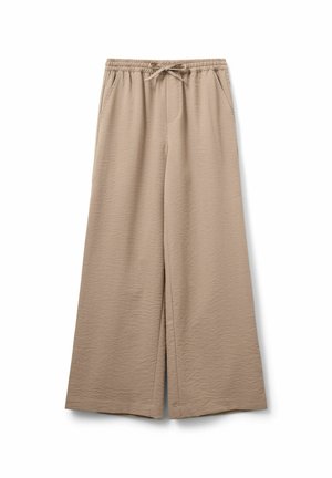 Beige vida byxor i strukturerad väv, med resårmidja och dragsko samt sidofickor.