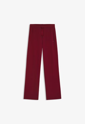 Burgundy wide-leg pants made from soft fabric, featuring an elastic waistband with a drawstring and subtle branding on the side.