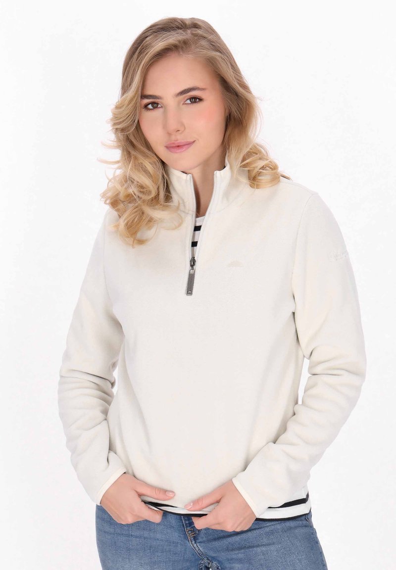 Pullover in pile beige chiaro con collo a mezza zip. Presenta un orlo a strisce scure e maniche lunghe. Texture morbida, branding minimale.