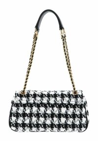 Sac en tweed noir et blanc avec un design matelassé, chaîne dorée et anse en cuir noir. Forme rectangulaire compacte avec un tissu texturé.