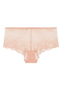 Culotte en dentelle dans un doux rose pâle, ornée de motifs floraux, de bords festonnés et d'un détail en ruban au centre. Texture élastique et délicate.