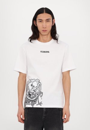 White cotton t-shirt featuring a large gray illustration of a cartoon character on the lower left side and "ICEBERG" logo above it.