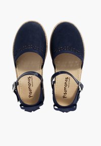 Navy blue suede sandals with a round toe, cut-out design on the toe strap, and an ankle strap with a silver buckle. Natural textured insole.