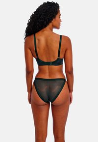 Ensemble de bikini vert avec un motif texturé, des bretelles ajustables et une coupe classique, montrant la vue arrière.