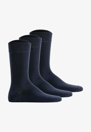 Drei Paar marineblaue Socken aus weichem Stoff, mit einem gerippten Bündchen, glatter Textur und verstärktem Zehenbereich.