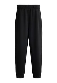 Black sweatpants with an elastic waistband, tapered legs, and ribbed cuffs. Made from soft fabric, featuring side seams for added detail.