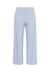 Hellblaue, weit geschnittene Hosen aus weichem, strukturiertem Stoff. Verfügt über einen elastischen Bund und eine verkürzte Länge ohne sichtbare Taschen.