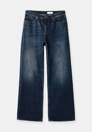 Leveälahkeiset tummat denimmekot haalistuneella pesulla, viiden taskun malli, kultaiset yksityiskohdat ja suora leikkaus lantiosta lahkeen reunaan.