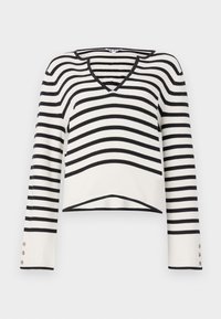Black and white striped sweater, V-neck design, long sleeves with button accents, knitted texture, cropped hem.