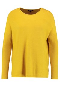 Pull en tricot jaune avec un col rond, des manches longues et une coupe décontractée. Présente des fentes sur les côtés de l'ourlet pour faciliter les mouvements.