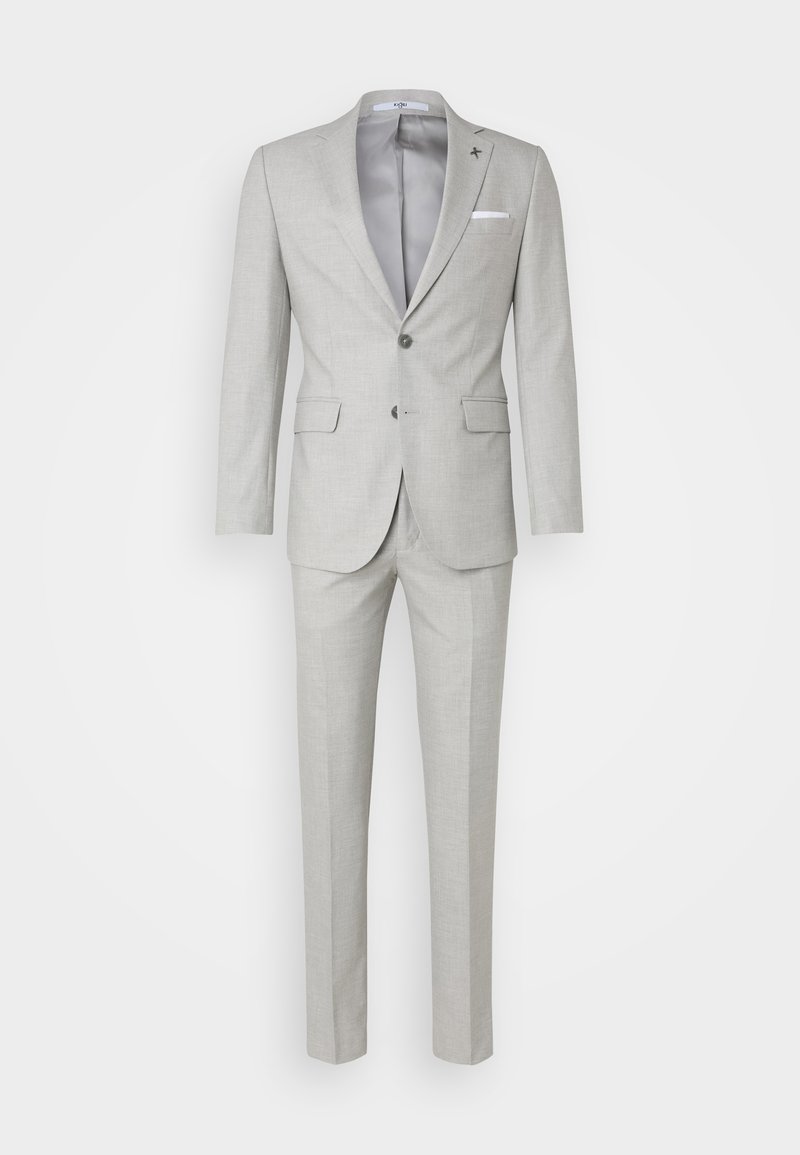 Világosszürke zakó, slim fit, egygombos, hajtókás gallérral, és hozzáillő nadrággal. Finom textúrával és fehér zsebkendő részlettel.