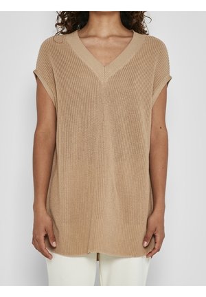 Haut en tricot beige avec un col en V, des manches courtes et une coupe ample. Comprend un tissu texturé et un ourlet droit, conçu pour le confort.