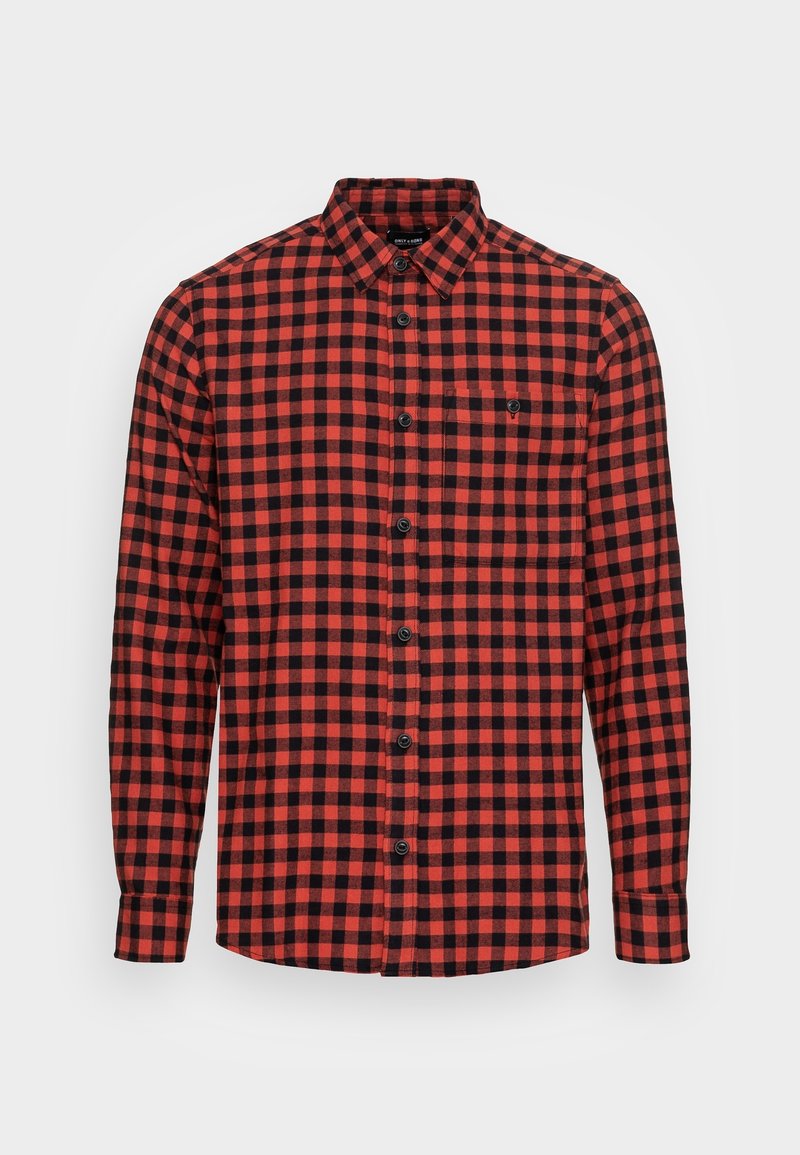 Chemise en flanelle à carreaux rouges et noirs, à manches longues, avec un bouton sur le devant, un col boutonné et une poche sur la poitrine. Texture douce.