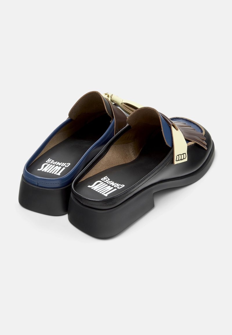 Platform slides with a black sole, brown and blue synthetic upper, and cream accents. Features a rounded toe and open back design.