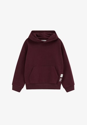 Sweat à capuche bordeaux avec une poche kangourou à l'avant et une petite étiquette blanche en bas à droite.