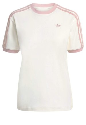 T-shirt de manga curta creme com detalhes em rosa nas costuras dos ombros e punhos. Apresenta um pequeno logo no peito e um decote redondo clássico.
