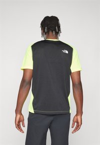 The North Face LIGHTBRIGHT TEE - T-skjorte til trening - lemon yellow/black