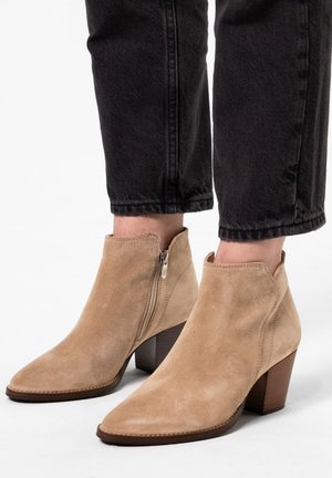 Manfield Enkelkaarsjes - beige