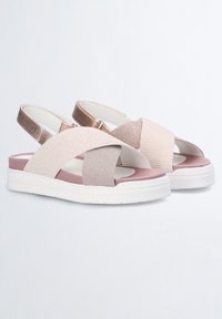 Keve, ristirihmasandaalid pehmes beežis ja roosades toonides. Omavad elastseid rihmasid, pehmendatud tallat ja tekstureeritud viimistlust.