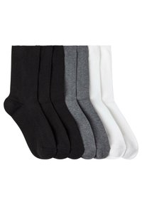 Set aus sieben Socken in einfarbigen Farben: Schwarz, Dunkelgrau, Hellgrau und Weiß. Hergestellt aus einem weichen, dehnbaren Material mit geripptem Design.