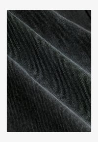 Valittu, washed black leopard print